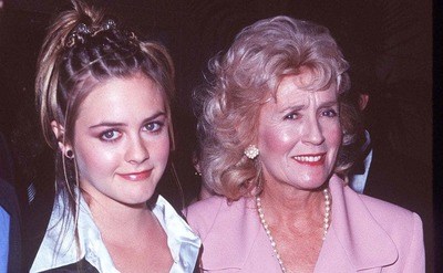 Alicia Silverstone and her mother are posing for the press during 2nd Annual Humane from Hollywood Gala circa 1997.