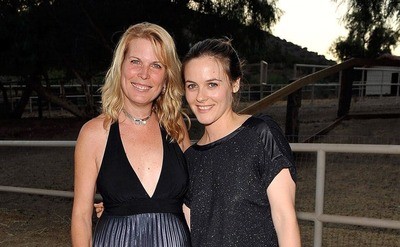 Lorrie Bauston, co-founder of Animal Acres, and Alicia Silverstone at a farm attending the 2008 Animal Acres Sanctuary Benefit.